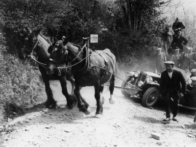 horses-pulling-broken-down-mg-up-a-hill-during-a-trial-1930-s.jpg