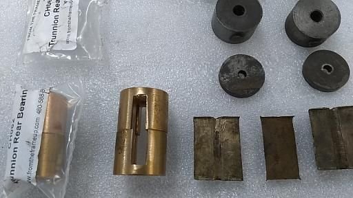 Closeup of the old and new bearings.